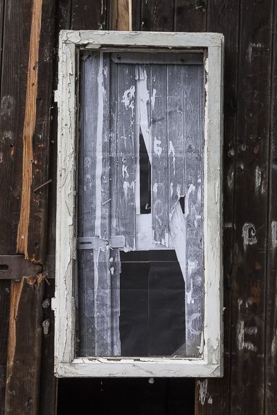 Witness — framed photograph in window frame