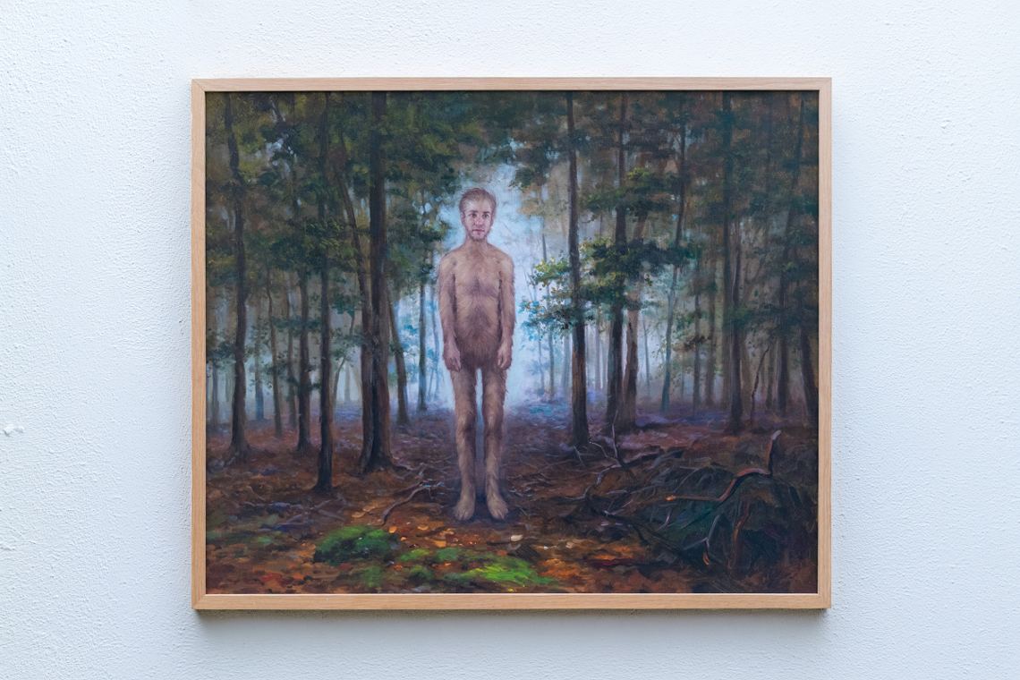 Wolf Man In Forest, installed on a gallery wall